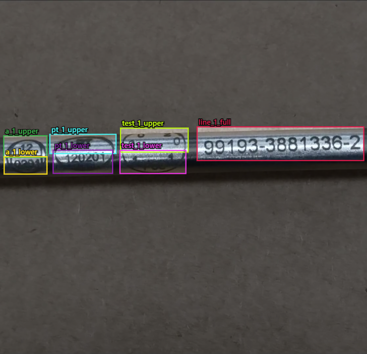 Metal tube with engraved stamps and jet-ink labels boxed by the detector